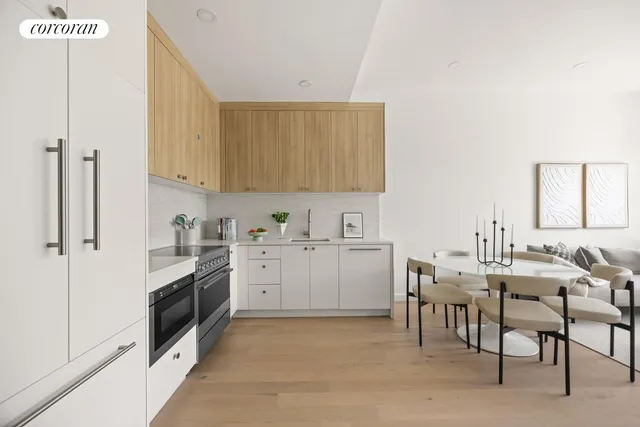 a bedroom with a bed and glass window