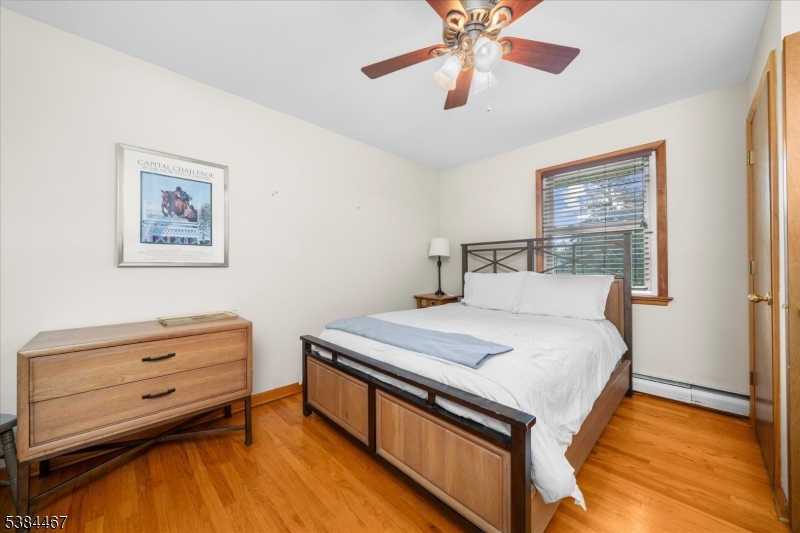 154 Old Croton Road Flemington, NJ 08822 - Photo 12 of 17 a bedroom with a bed and a dresser