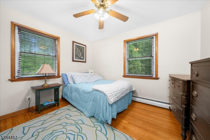 154 Old Croton Road Flemington, NJ 08822 - Photo 8 of 17 a bed room with a bed and two windows