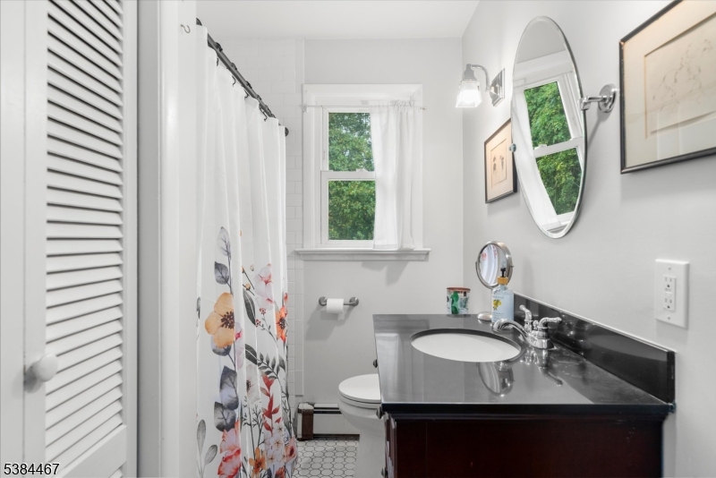 154 Old Croton Road Flemington, NJ 08822 - Photo 9 of 17 a bathroom with a sink and a mirror