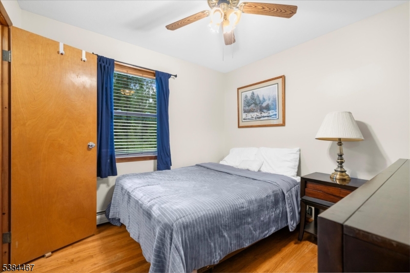 154 Old Croton Road Flemington, NJ 08822 - Photo 10 of 17 a bedroom with a bed and a desk