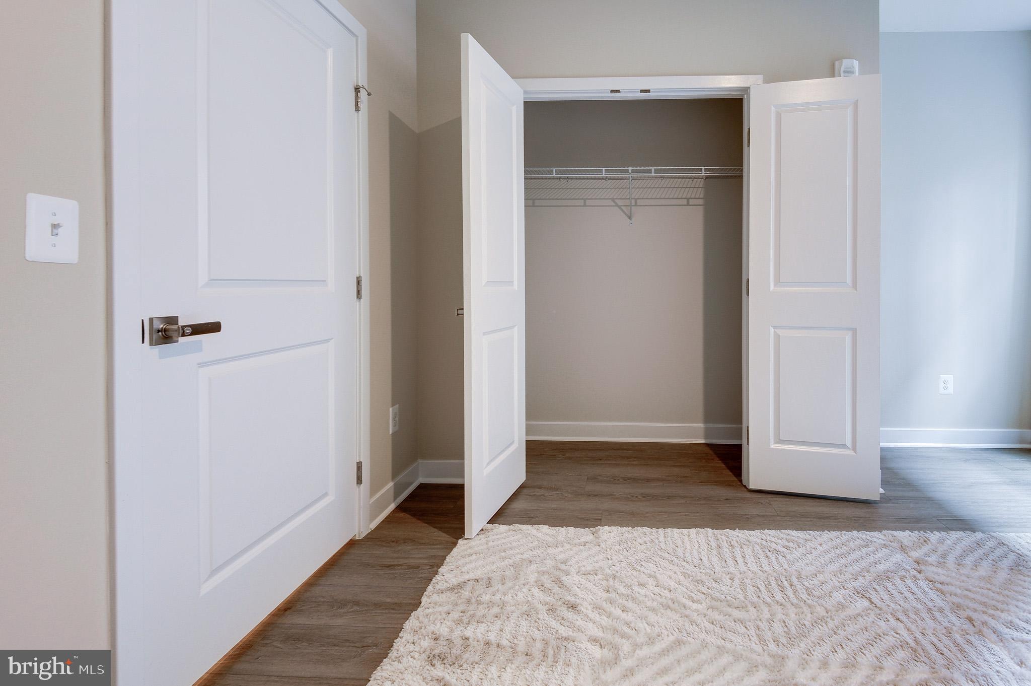4395 Peach Lily Lane, Unit 304 Chantilly, VA 20151 - Photo 22 of 36 a view of bathroom with a sink and mirror