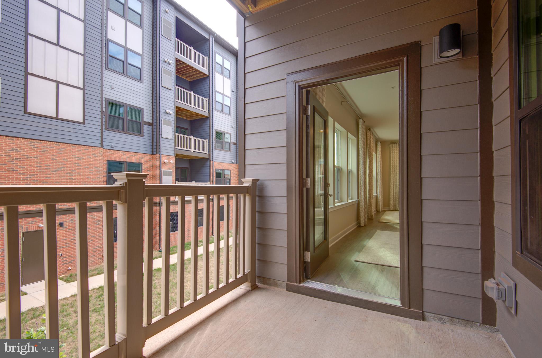 4395 Peach Lily Lane, Unit 304 Chantilly, VA 20151 - Photo 30 of 36 a view of a balcony from door