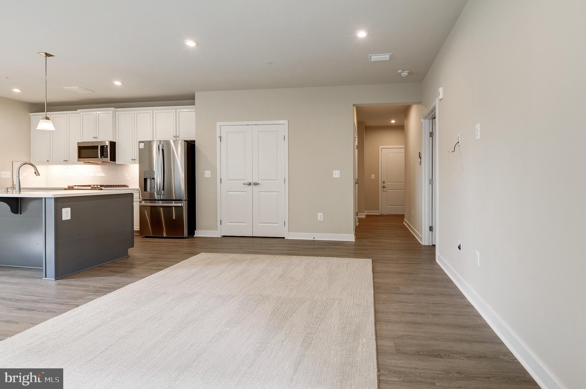 4395 Peach Lily Lane, Unit 304 Chantilly, VA 20151 - Photo 9 of 36 a view of a kitchen with a sink