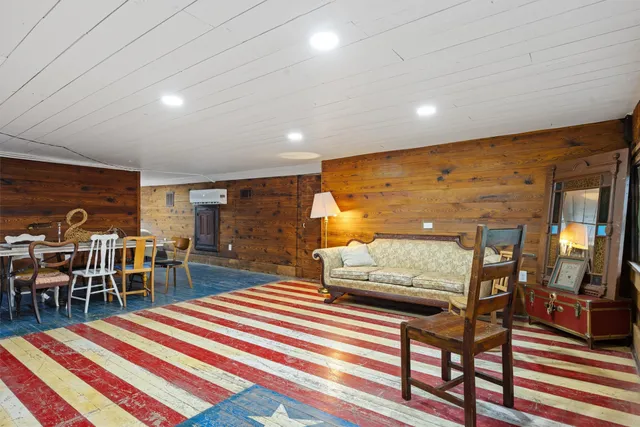 a bed room with a bed and a window