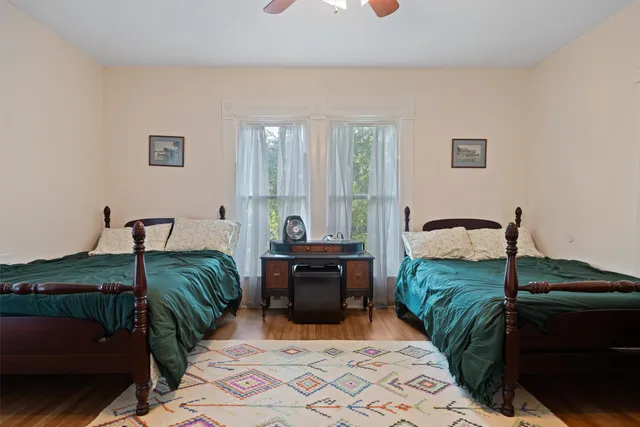 a bathroom with a toilet and a shower curtain