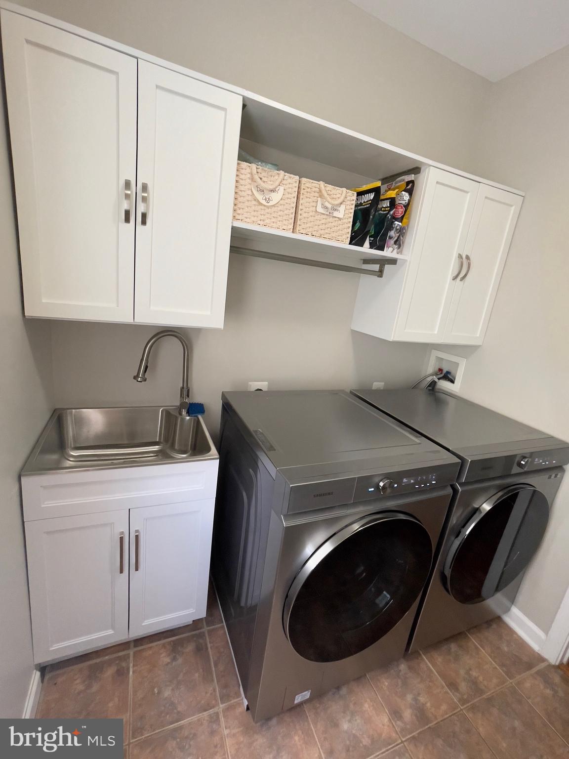23215 Frederick Road Clarksburg, MD 20871 - Photo 27 of 31 a utility room with sink dryer and washer