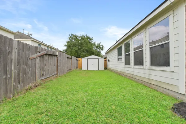 a house view with a garden space
