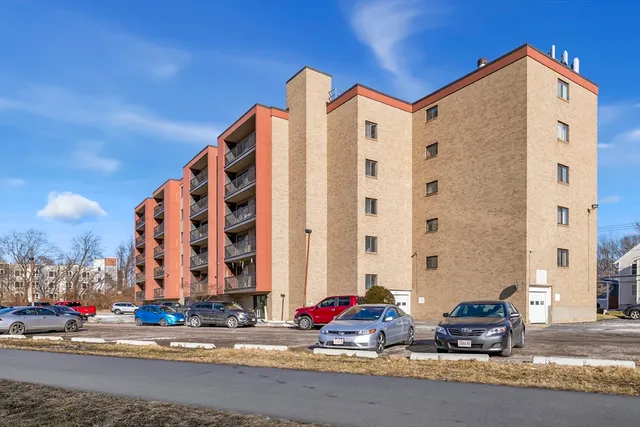 a front view of building with street view