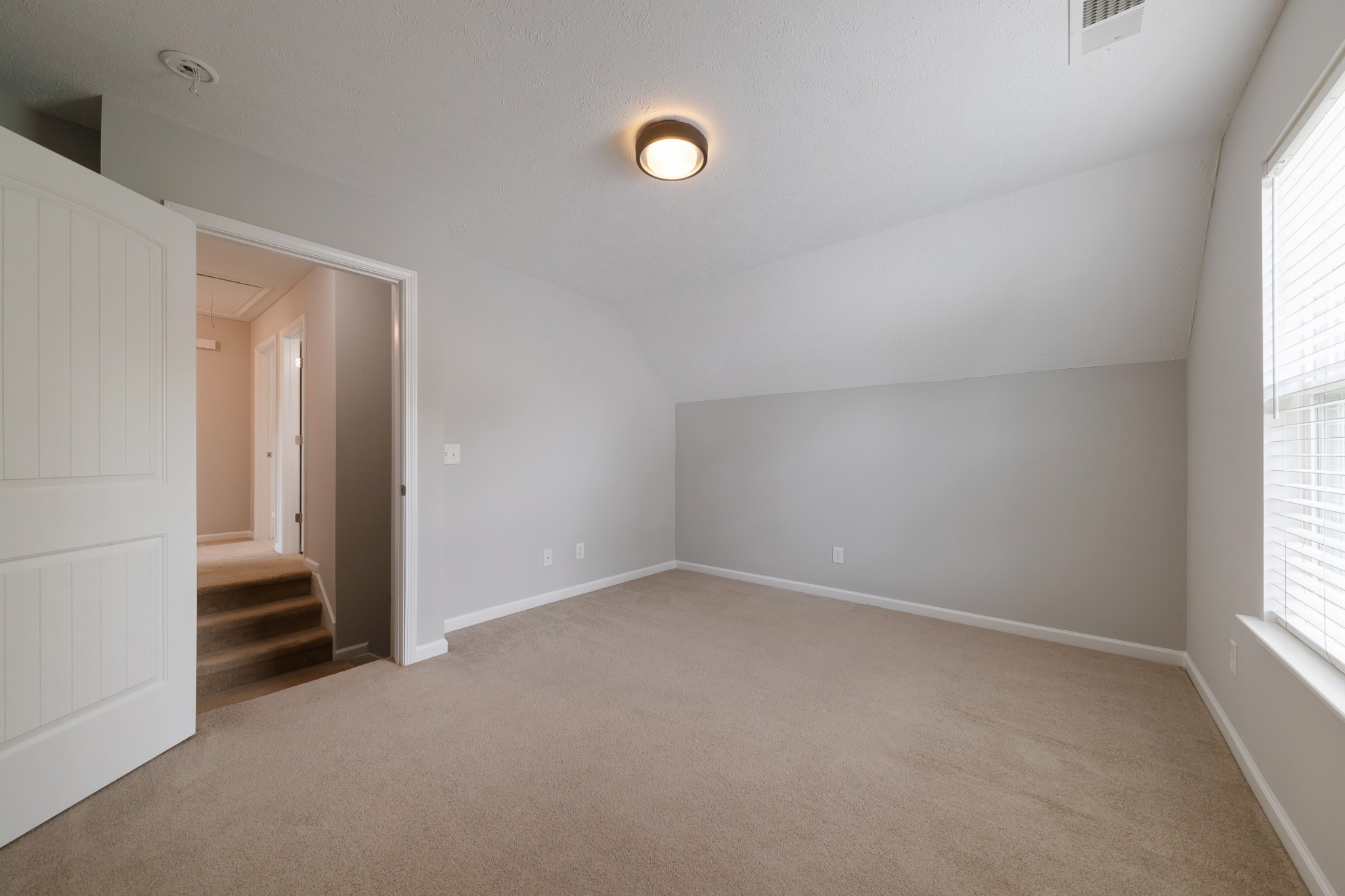 921 Woodall Road Lebanon, TN 37090 - Photo 19 of 30 an empty room with windows and closet