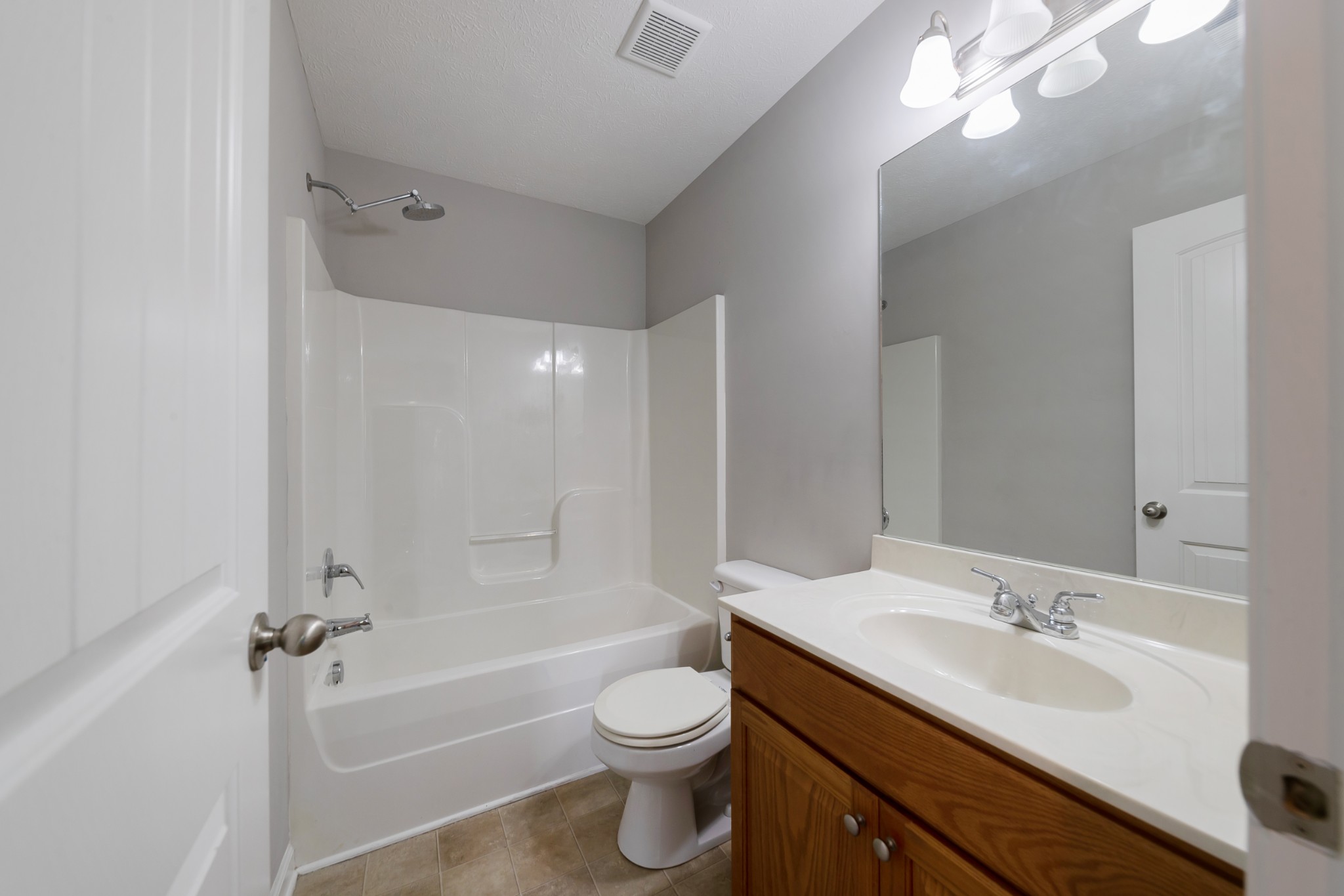 921 Woodall Road Lebanon, TN 37090 - Photo 23 of 30 a bathroom with a sink a toilet and shower