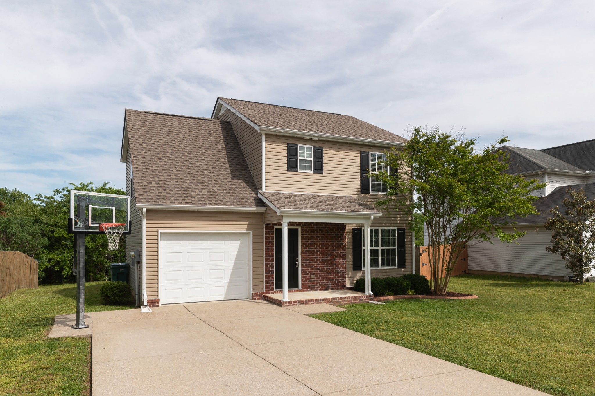 921 Woodall Road Lebanon, TN 37090 - Photo 3 of 30 a front view of a house with a garden