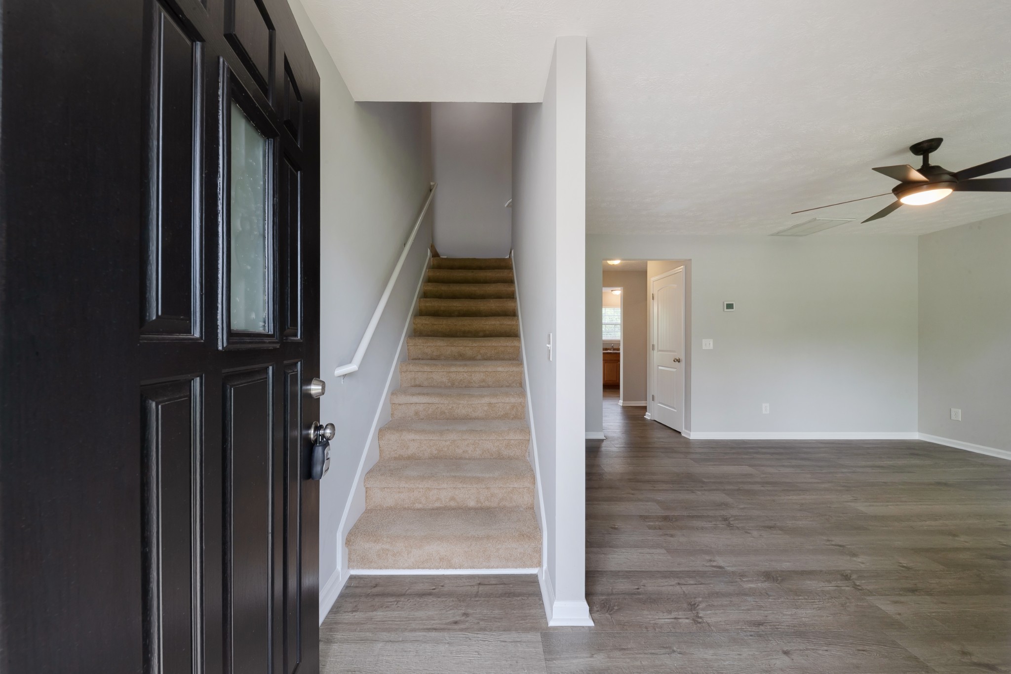 921 Woodall Road Lebanon, TN 37090 - Photo 5 of 30 a view of an entryway with wooden floor and staircase