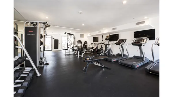 a view of a room with gym equipment