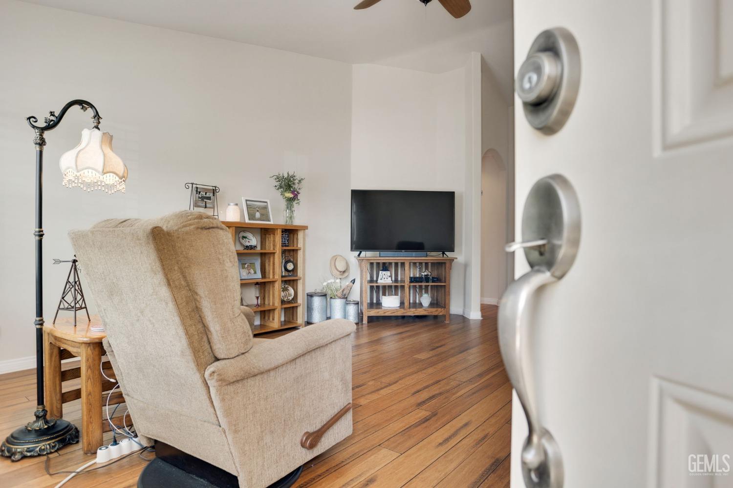 Undisclosed Address Taft, CA 93268 - Photo 16 of 60 a view of a livingroom with furniture and a flat screen tv