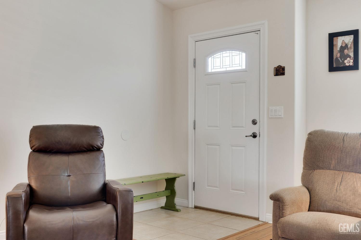 Undisclosed Address Taft, CA 93268 - Photo 17 of 60 a living room with furniture and a window