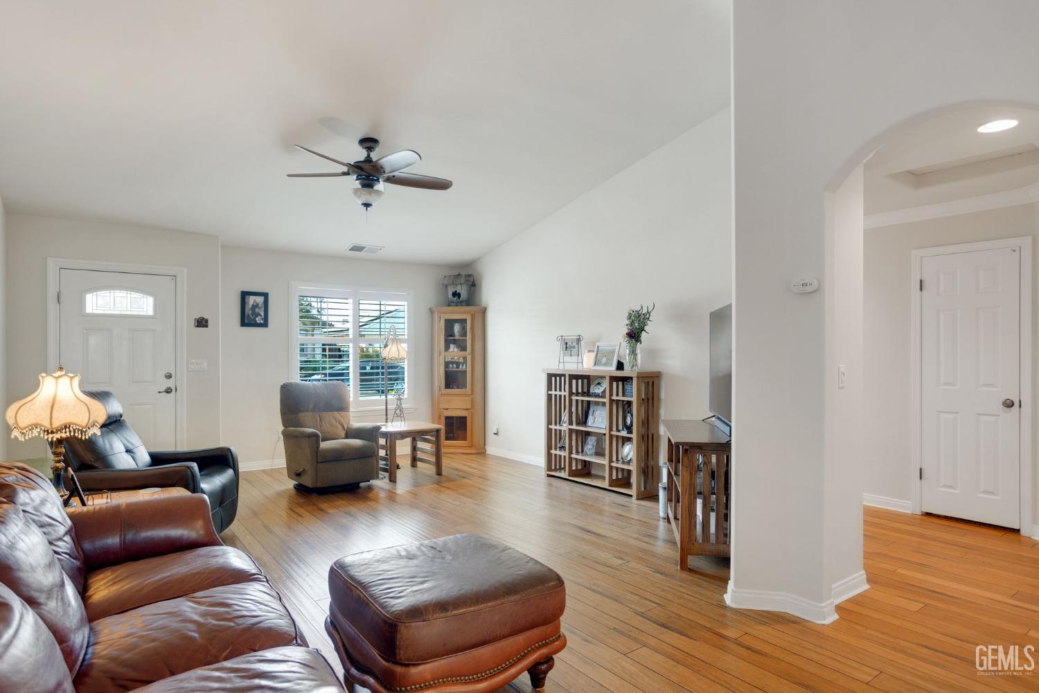 Undisclosed Address Taft, CA 93268 - Photo 20 of 60 a living room with furniture and a wooden floor