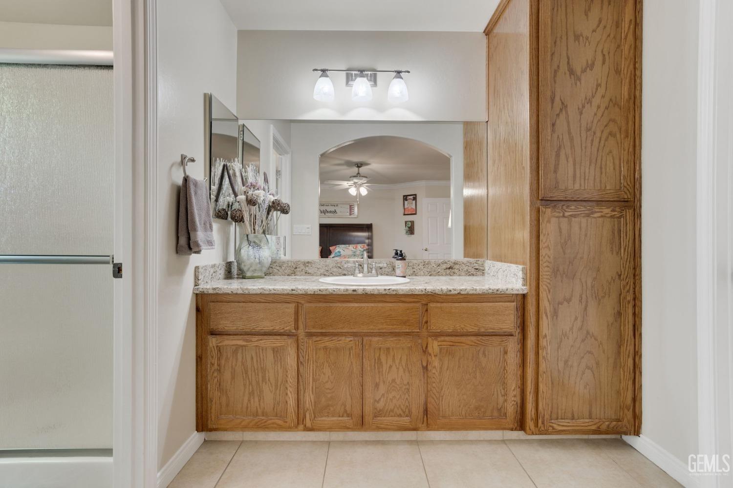 Undisclosed Address Taft, CA 93268 - Photo 39 of 60 a bathroom with a sink and a mirror