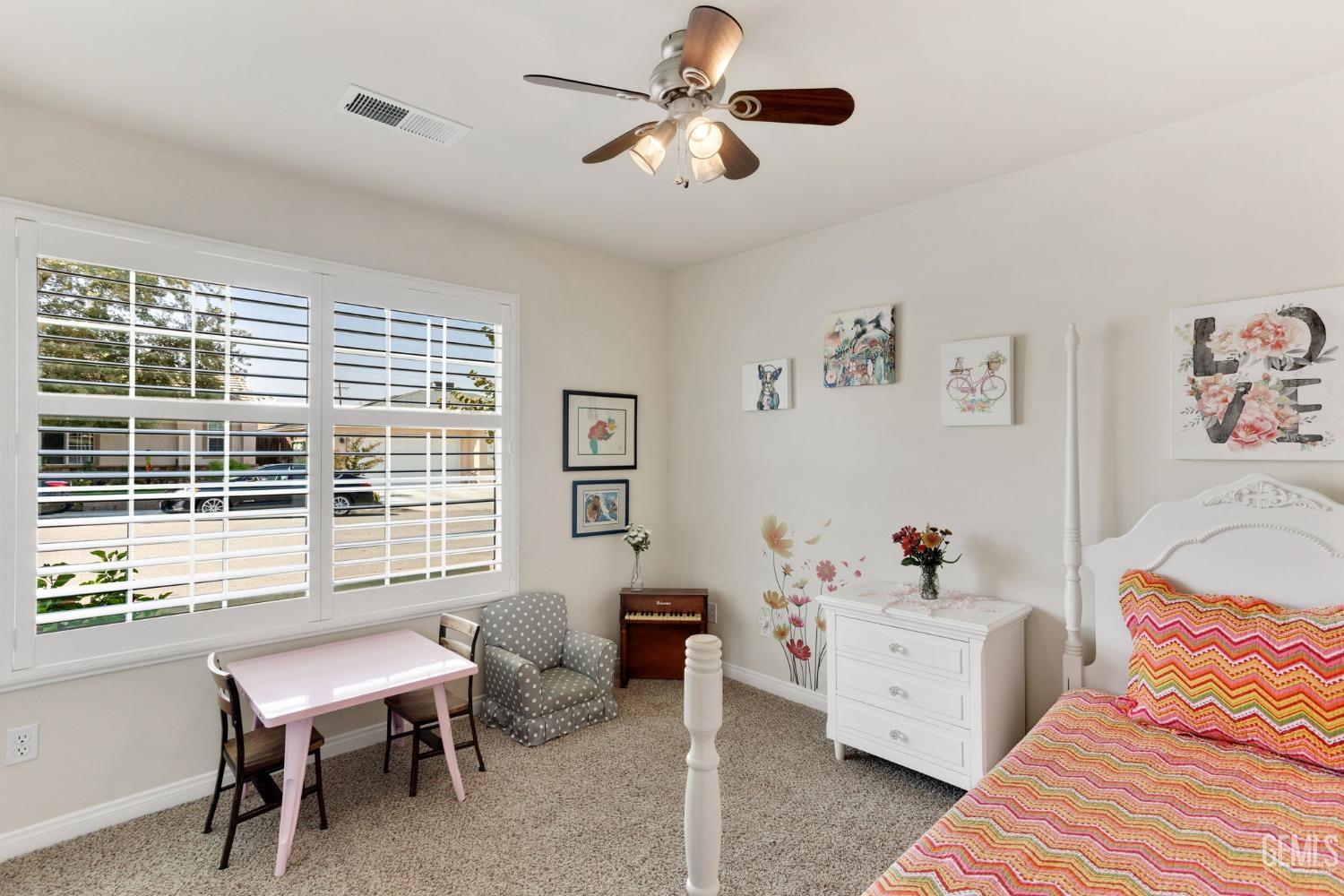 Undisclosed Address Taft, CA 93268 - Photo 42 of 60 a living room with furniture a window and a chandelier