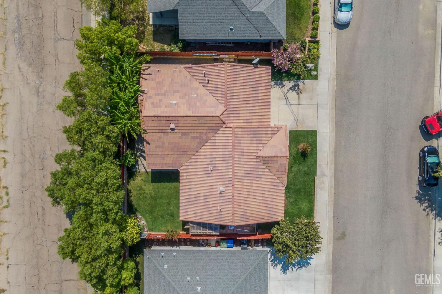Undisclosed Address Taft, CA 93268 - Photo 55 of 60 an aerial view of a house with a yard and garden