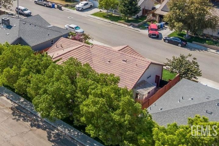 Undisclosed Address Taft, CA 93268 - Photo 60 of 60 an aerial view of a house with a yard and garden