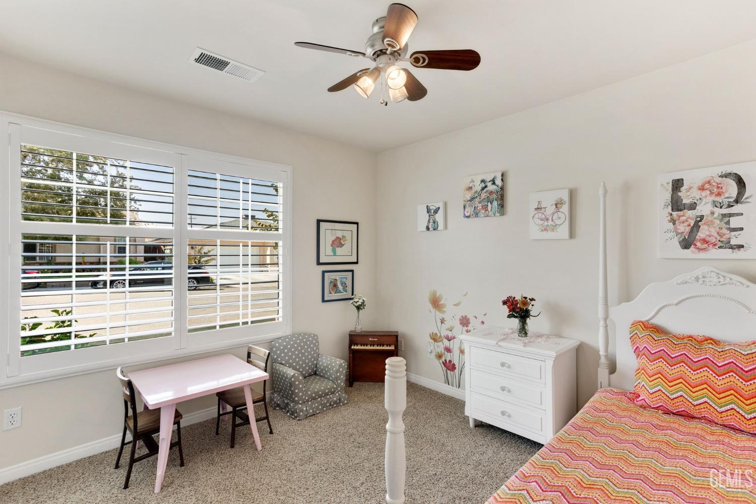 Undisclosed Address Taft, CA 93268 - Photo 8 of 60 a living room with furniture a window and a chandelier