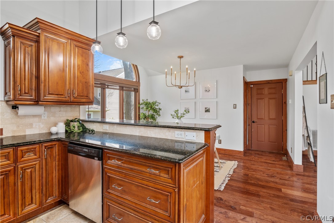 6218 Willow Glen Road Midlothian, VA 23112 - Photo 13 of 45 a kitchen with stainless steel appliances granite countertop wooden cabinets and a counter top space