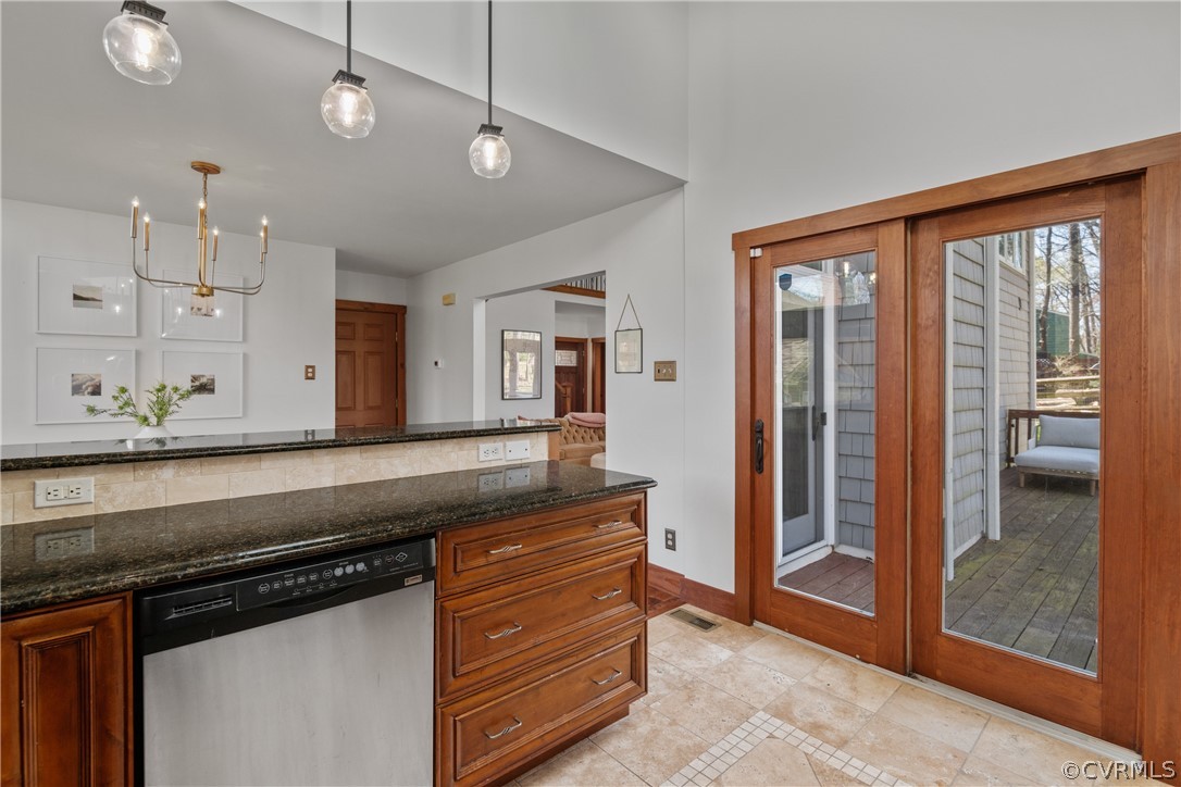 6218 Willow Glen Road Midlothian, VA 23112 - Photo 14 of 45 a kitchen with stainless steel appliances granite countertop a refrigerator a sink and a stove