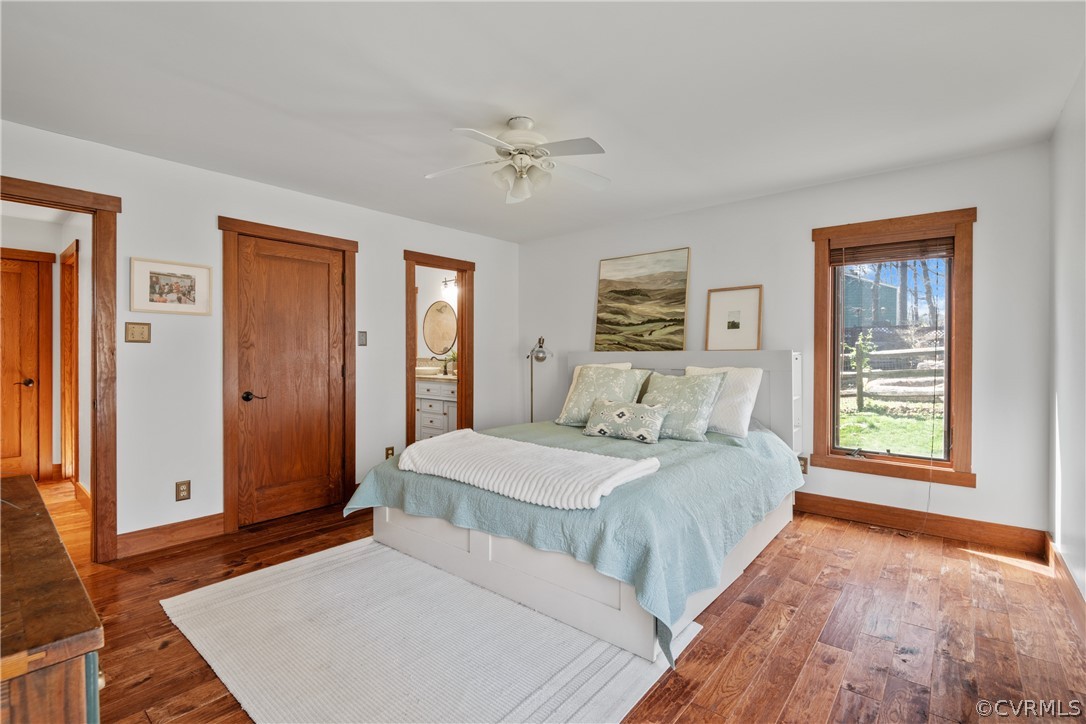 6218 Willow Glen Road Midlothian, VA 23112 - Photo 18 of 45 a bedroom with a large bed and a window
