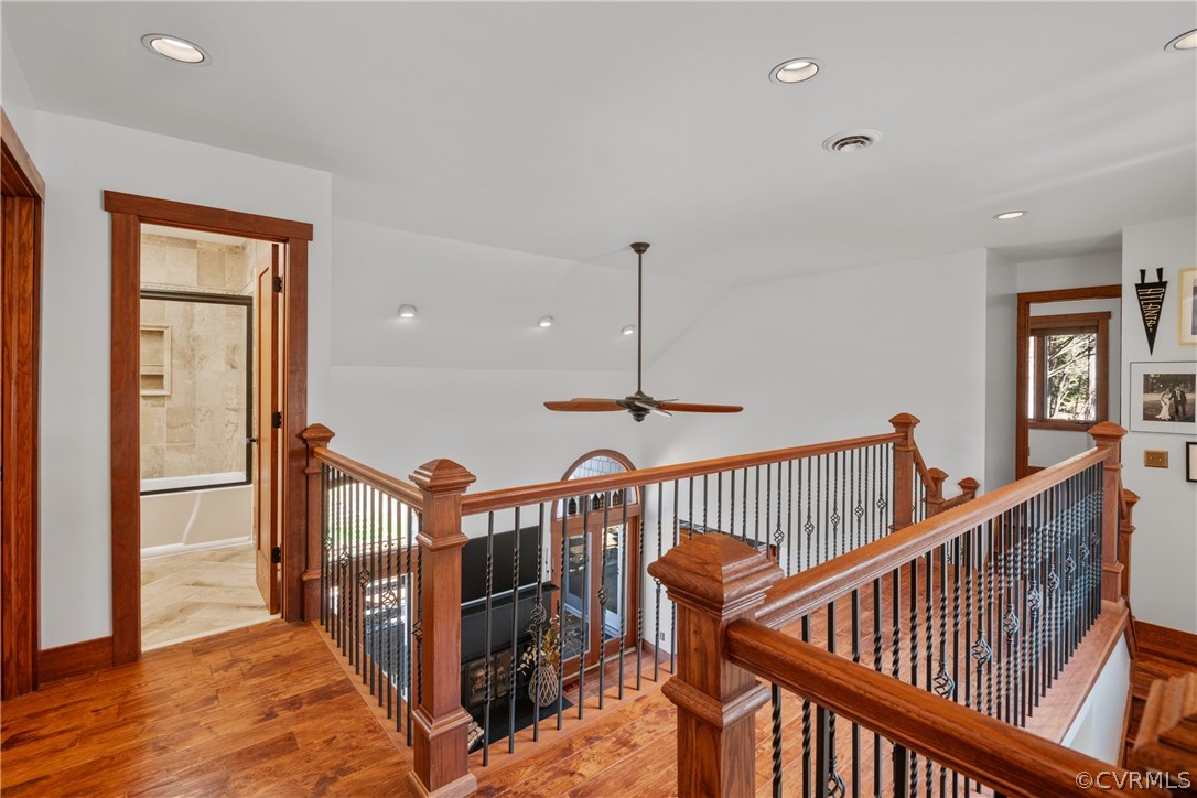 6218 Willow Glen Road Midlothian, VA 23112 - Photo 22 of 45 a view of a hallway with wooden floor and stairs
