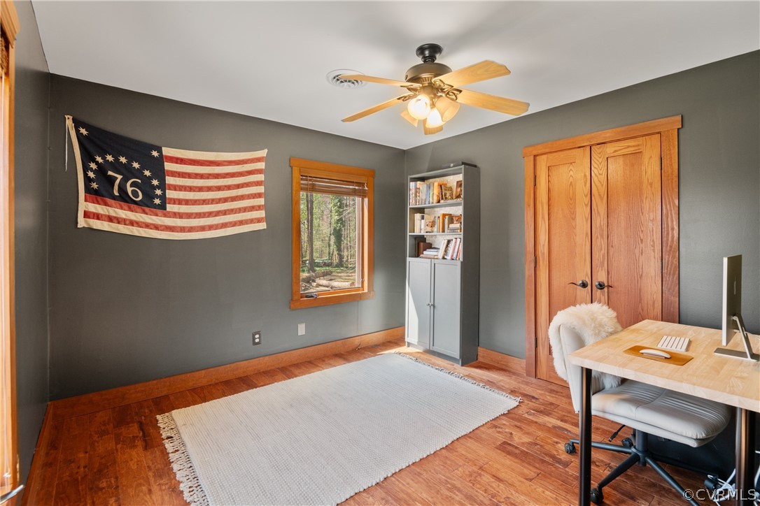 6218 Willow Glen Road Midlothian, VA 23112 - Photo 24 of 45 a bedroom with a bed and a chandelier