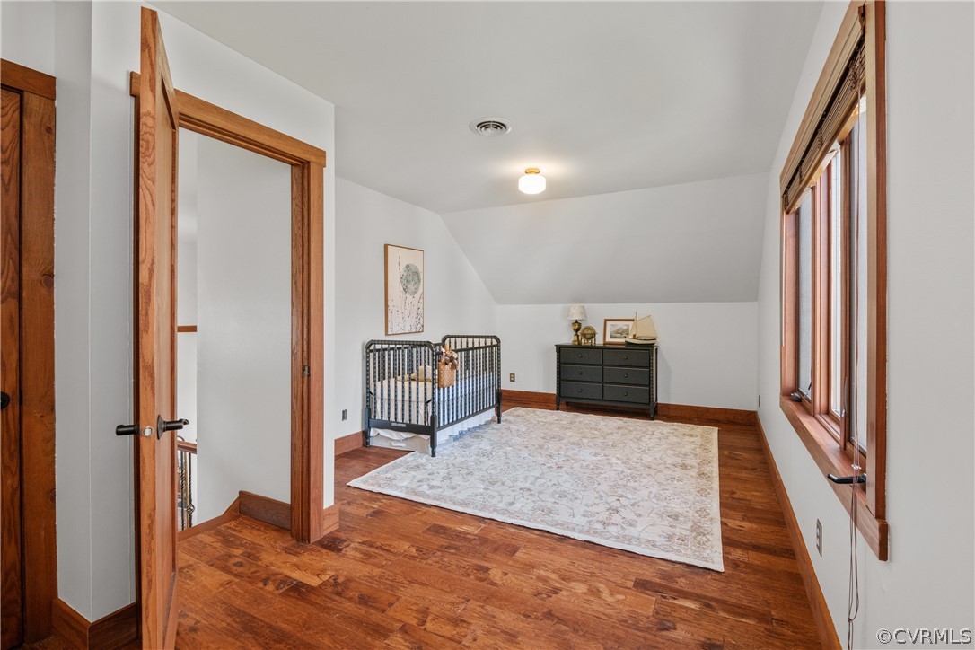 6218 Willow Glen Road Midlothian, VA 23112 - Photo 29 of 45 a view of a hallway with wooden floor and staircase