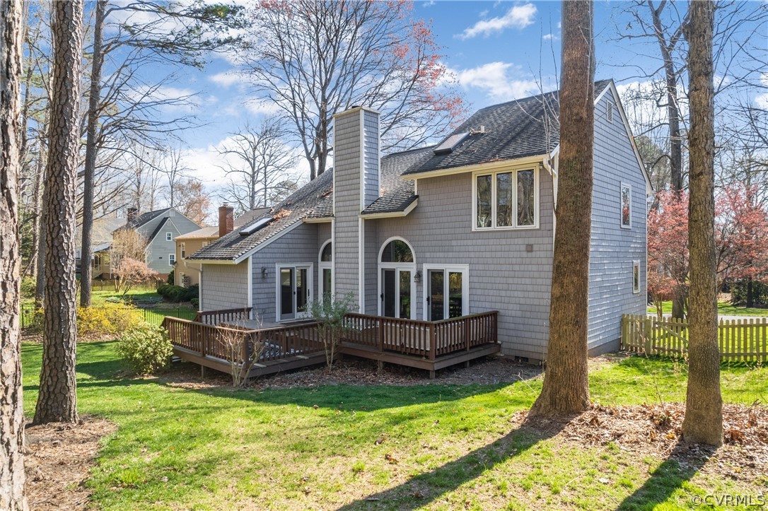 6218 Willow Glen Road Midlothian, VA 23112 - Photo 36 of 45 a front view of a house with a yard table and chairs