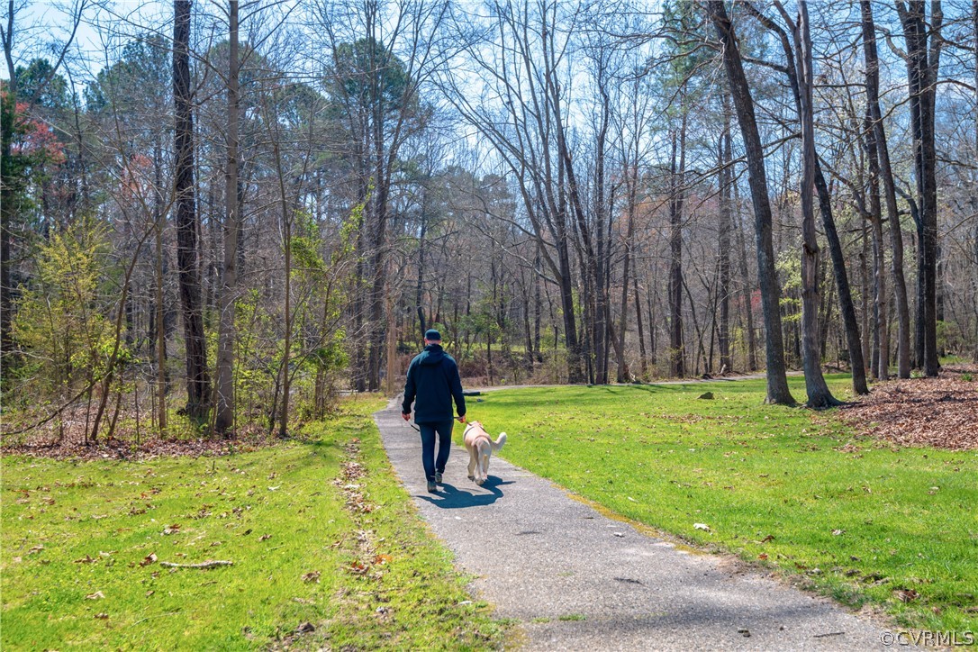 6218 Willow Glen Road Midlothian, VA 23112 - Photo 37 of 45 a view of a backyard with large trees