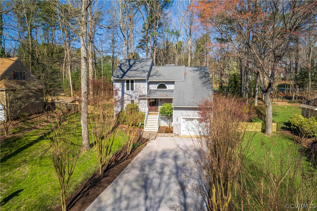 6218 Willow Glen Road Midlothian, VA 23112 - Photo 38 of 45 a view of a pathway of a building