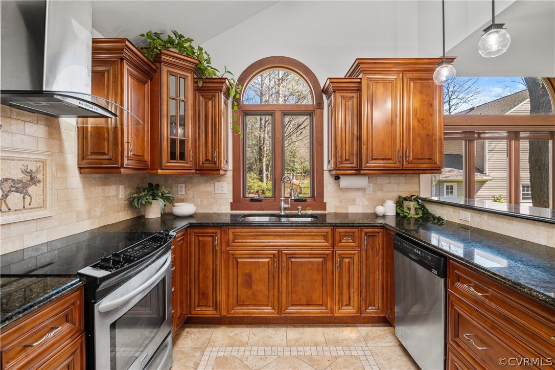 6218 Willow Glen Road Midlothian, VA 23112 - Photo 45 of 45 a kitchen with stainless steel appliances granite countertop a stove a sink and a microwave