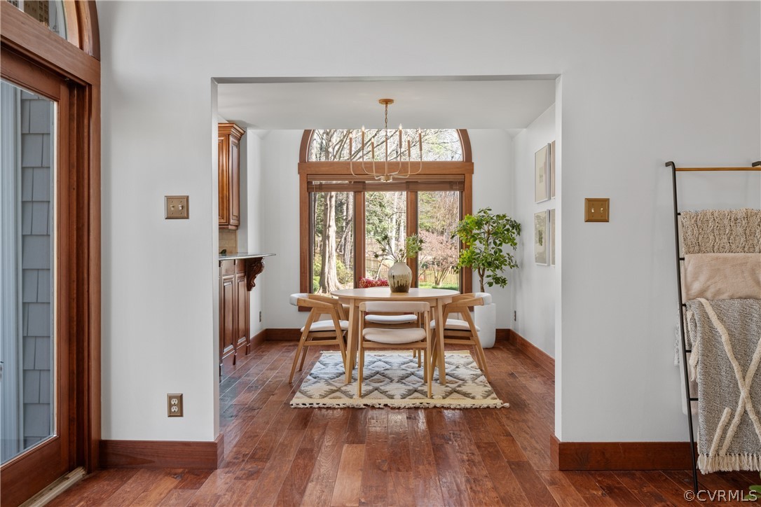 6218 Willow Glen Road Midlothian, VA 23112 - Photo 7 of 45 a dining room with a window and wooden floor