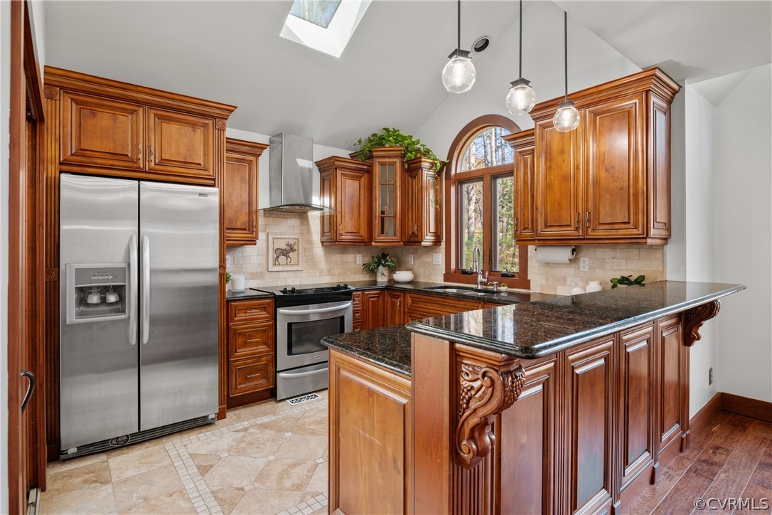6218 Willow Glen Road Midlothian, VA 23112 - Photo 10 of 45 a kitchen with stainless steel appliances granite countertop a refrigerator a stove and a sink with wooden floor