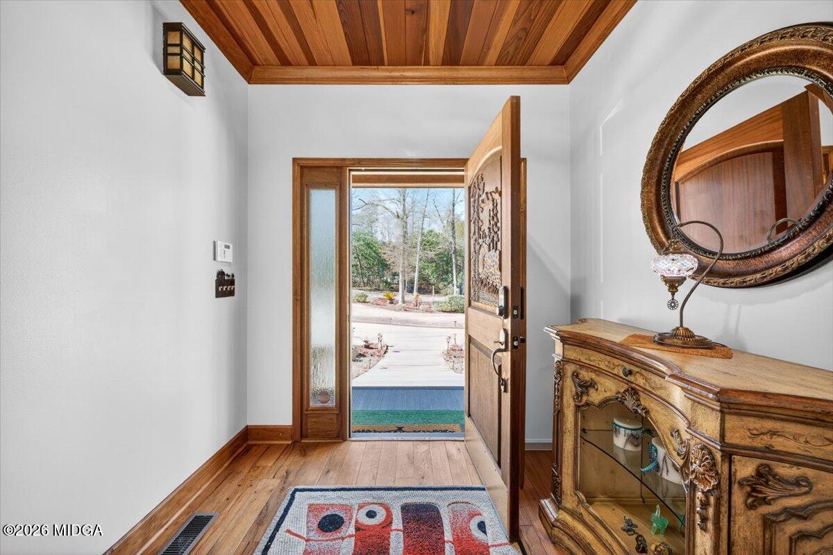 306 Thomson Street Centerville, GA 31028 - Photo 3 of 38 a view of an entryway with a door