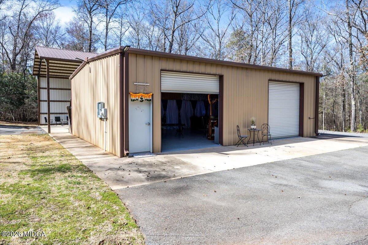 306 Thomson Street Centerville, GA 31028 - Photo 32 of 38 a view of a house with backyard