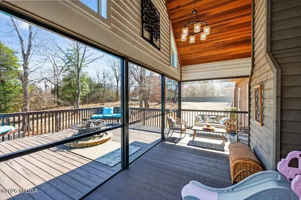 a view of a living room and wooden floor