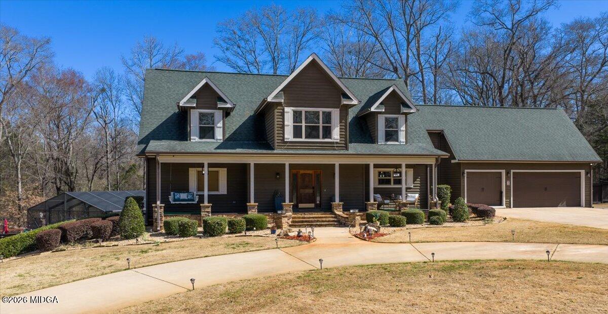 306 Thomson Street Centerville, GA 31028 - Photo 35 of 38 front view of house with a patio