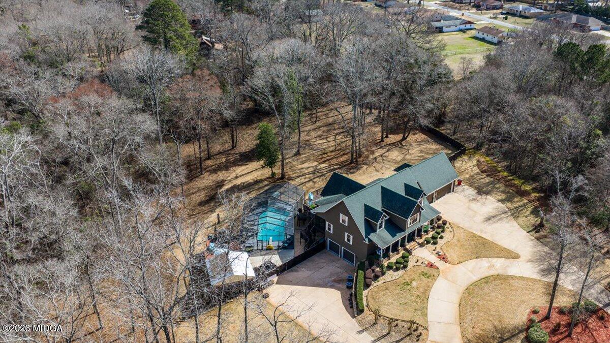 306 Thomson Street Centerville, GA 31028 - Photo 36 of 38 an aerial view of a house with yard swimming pool and outdoor seating