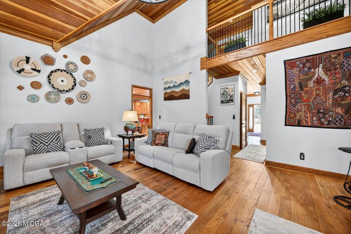 306 Thomson Street Centerville, GA 31028 - Photo 7 of 38 a living room with furniture and a rug