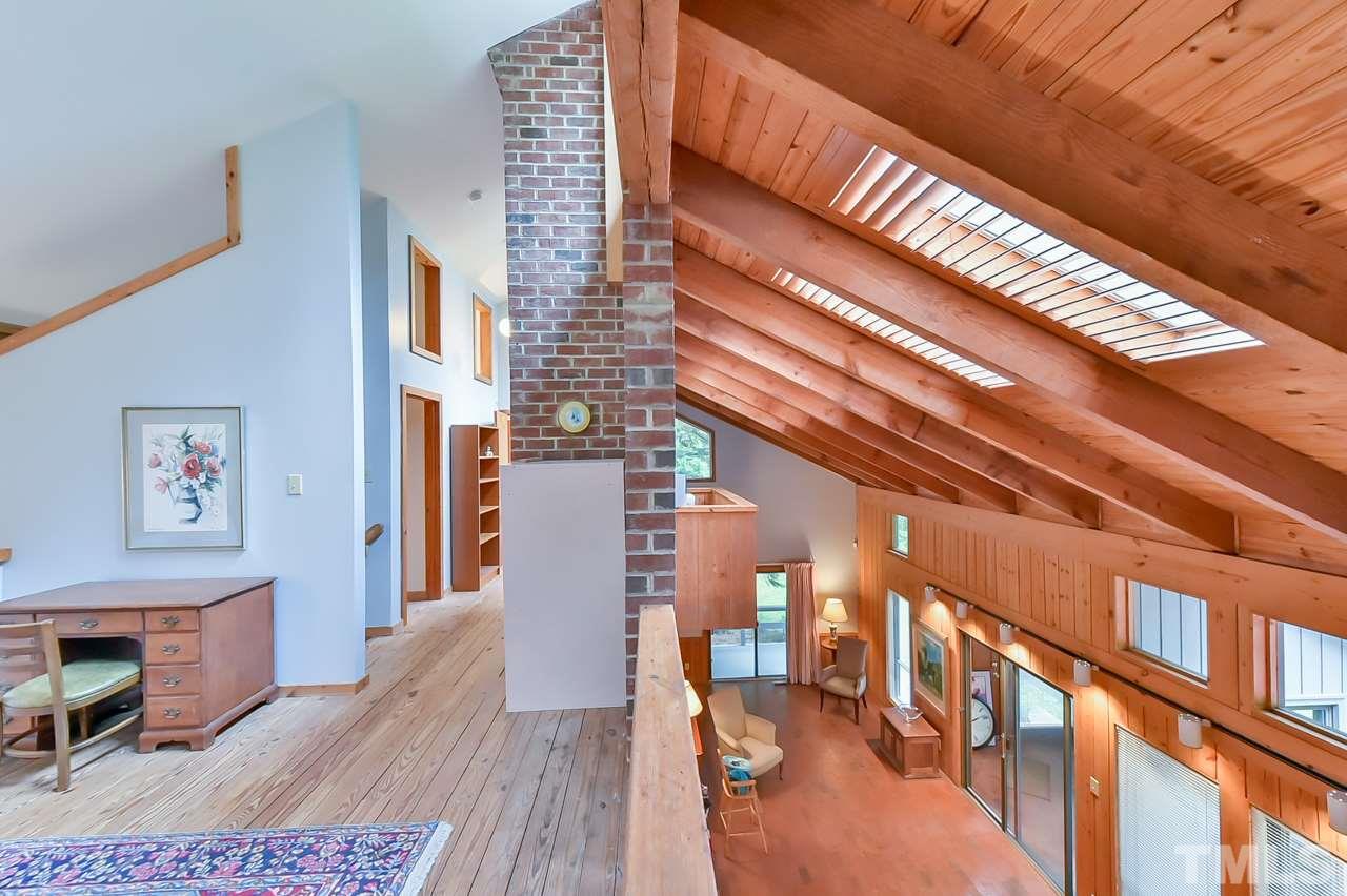 214 Clark Lake Road Durham, NC 27707 - Photo 19 of 30 a view of entryway with wooden floor