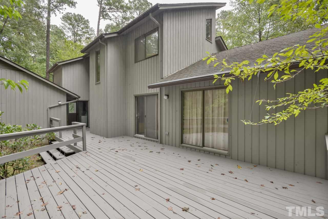 214 Clark Lake Road Durham, NC 27707 - Photo 3 of 30 a backyard of a house