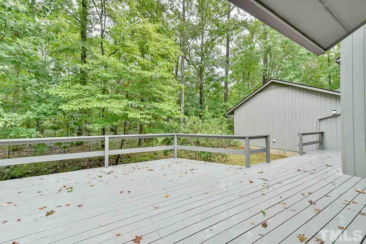 214 Clark Lake Road Durham, NC 27707 - Photo 25 of 30 a view of outdoor space yard and deck