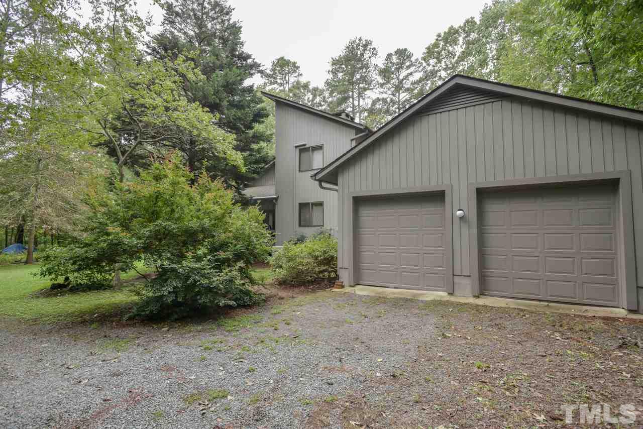 214 Clark Lake Road Durham, NC 27707 - Photo 28 of 30 a house with a outdoor space