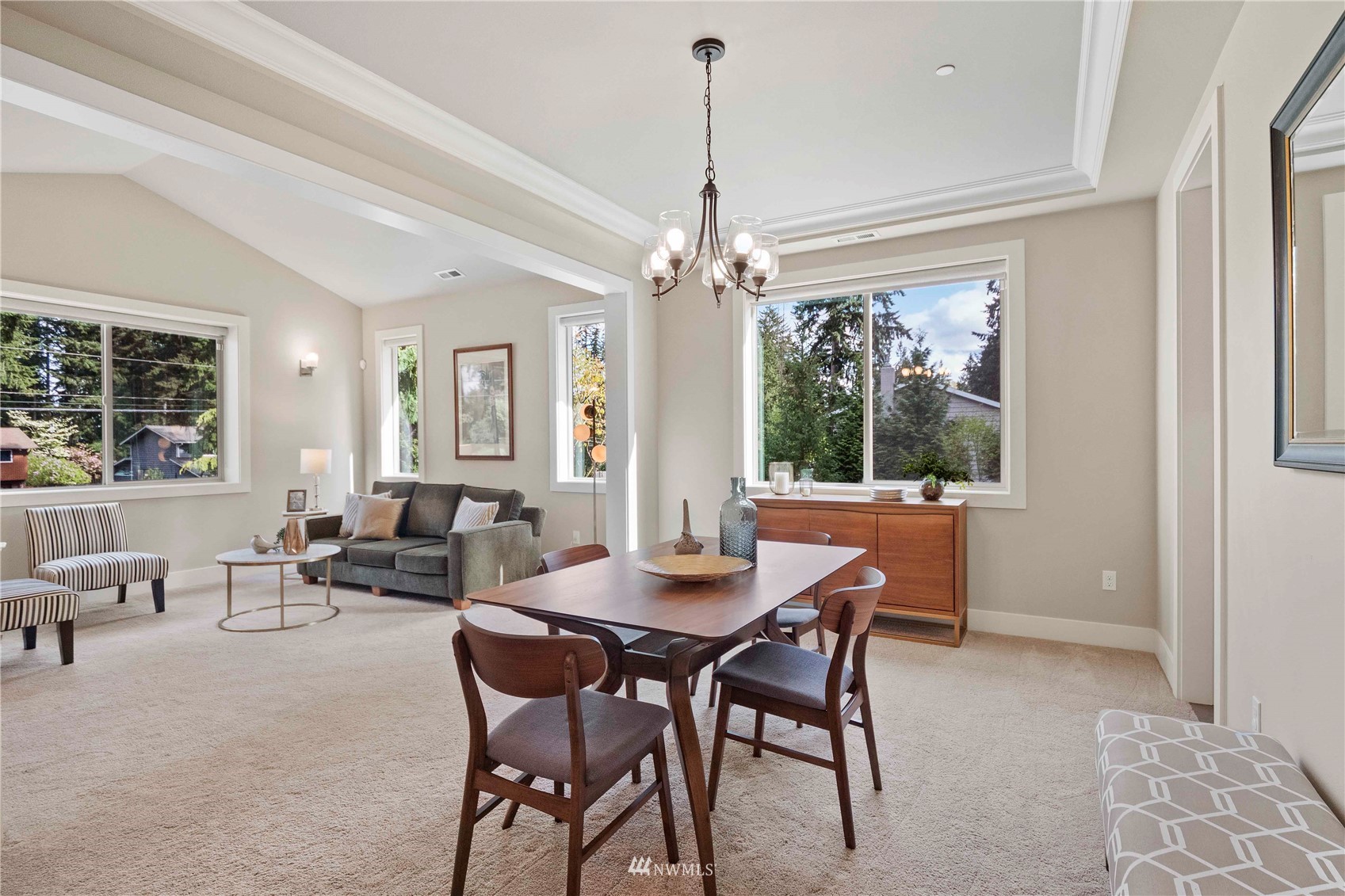24212 23rd Avenue West Bothell, WA 98021 - Photo 13 of 40 a dining room with furniture a chandelier and window