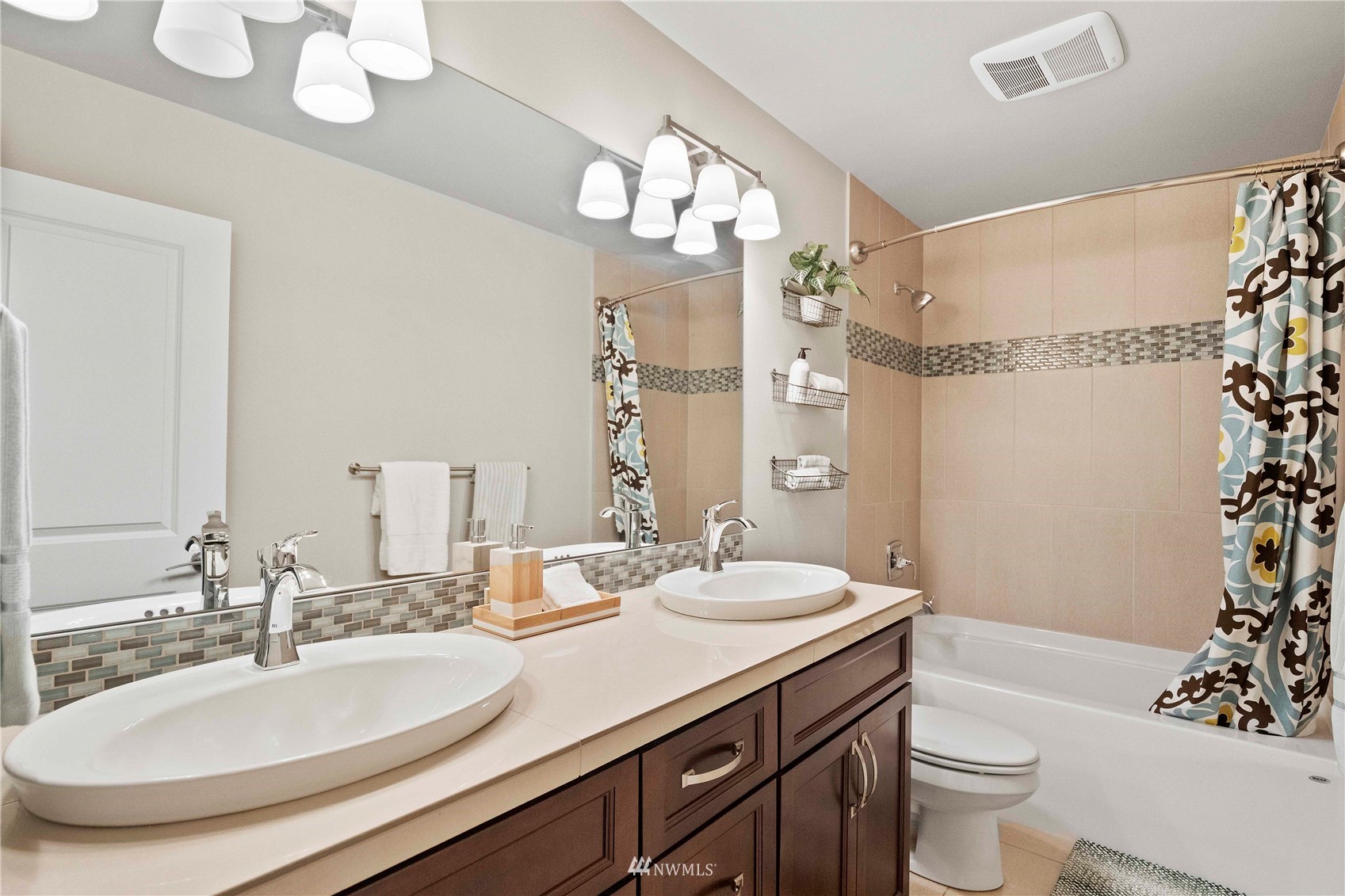 24212 23rd Avenue West Bothell, WA 98021 - Photo 28 of 40 a bathroom with a double vanity sink mirror and toilet